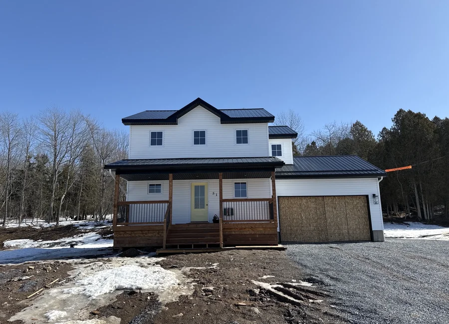 New construction home inspection winter Quispamsis New Brunswick residential exterior two-storey house